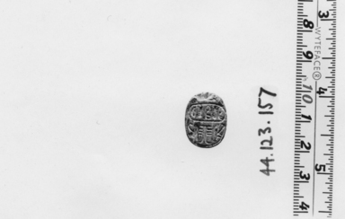  <em>Scarab</em>, ca. 1630-1539 B.C.E. Steatite, glaze, 5/16 x 9/16 x 3/4 in. (0.8 x 1.4 x 1.9 cm). Brooklyn Museum, Charles Edwin Wilbour Fund, 44.123.157. Creative Commons-BY (Photo: , CUR.44.123.157_NegA_print_bw.jpg)