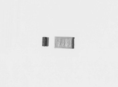 Ancient Near Eastern. <em>Cylinder Seal</em>, 16th-14th century B.C.E. Hematite, 9/16 x Diam. 1/4 in. (1.4 x 0.7 cm). Brooklyn Museum, Charles Edwin Wilbour Fund, 44.123.179. Creative Commons-BY (Photo: Brooklyn Museum, CUR.44.123.179_NegA_print_bw.jpg)