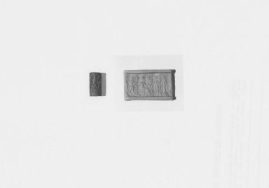 Ancient Near Eastern. <em>Cylinder Seal</em>, 16th-14th century B.C.E. Hematite, 11/16 x Diam. 3/8 in. (1.7 x 0.9 cm). Brooklyn Museum, Charles Edwin Wilbour Fund, 44.123.180. Creative Commons-BY (Photo: Brooklyn Museum, CUR.44.123.180_NegC_print_bw.jpg)