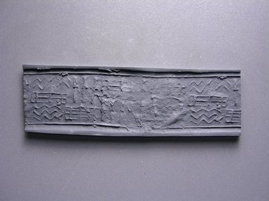  <em>Cylinder Seal</em>, ca. 3100-2625 B.C.E. Ivory, 1 1/8 x 7/8 in. (2.9 x 2.2 cm). Brooklyn Museum, Charles Edwin Wilbour Fund, 44.123.21. Creative Commons-BY (Photo: Brooklyn Museum, CUR.44.123.21_impression.jpg)