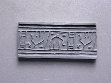  <em>Cylinder Seal</em>. Faience, 3/4 x 5/16 in. (1.9 x 0.8 cm). Brooklyn Museum, Charles Edwin Wilbour Fund, 44.123.43. Creative Commons-BY (Photo: Brooklyn Museum, CUR.44.123.43_impression1.jpg)