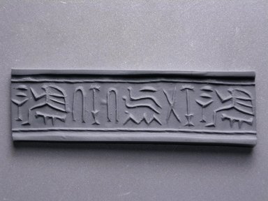  <em>Cylinder Seal of a Private Person</em>, ca. 3100-2675 B.C.E. Steatite, 5/8 x 9/16 in. (1.6 x 1.5 cm) . Brooklyn Museum, Charles Edwin Wilbour Fund, 44.123.4. Creative Commons-BY (Photo: Brooklyn Museum, CUR.44.123.4_impression.jpg)