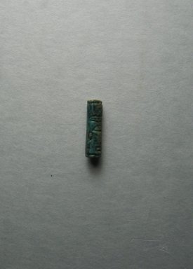  <em>Cylinder Seal</em>, ca. 1938–1759E B.C.E. Faience, 13/16 × Diam. 3/8 in. (2.1 × 1 cm). Brooklyn Museum, Charles Edwin Wilbour Fund, 44.123.59. Creative Commons-BY (Photo: , CUR.44.123.59_view01.jpg)