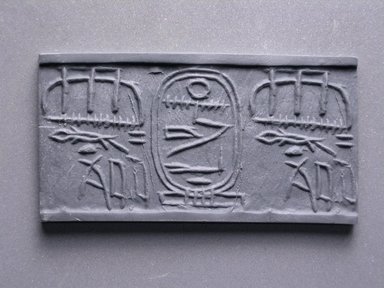  <em>Cylinder Seal</em>, ca. 1938–1759E B.C.E. Faience, 1 x 3/8 in. (2.6 x 1 cm). Brooklyn Museum, Charles Edwin Wilbour Fund, 44.123.67. Creative Commons-BY (Photo: Brooklyn Museum, CUR.44.123.67_impression.jpg)