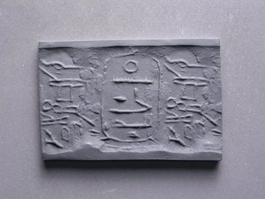  <em>Cylinder Seal</em>. Steatite, glaze, 1 1/16 x 1/4 in. (2.7 x 0.7 cm). Brooklyn Museum, Charles Edwin Wilbour Fund, 44.123.69. Creative Commons-BY (Photo: Brooklyn Museum, CUR.44.123.69_impression.jpg)