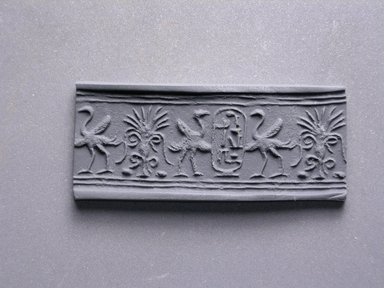  <em>Cylinder Seal</em>, ca. 1292-1190 B.C.E. Steatite, glaze, 11/16 x 5/16 in. (1.8 x 0.8 cm). Brooklyn Museum, Charles Edwin Wilbour Fund, 44.123.82. Creative Commons-BY (Photo: Brooklyn Museum, CUR.44.123.82_impression.jpg)