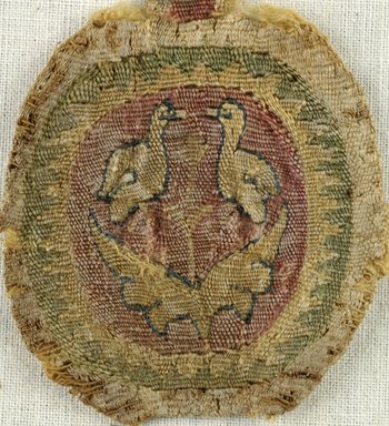Coptic. <em>2 Clavi Fragments with Animal and Botanical Decoration</em>, 5th century C.E. Linen, wool, 44.143f: 1 1/2 x 4 in. (3.8 x 10.2 cm). Brooklyn Museum, Charles Edwin Wilbour Fund, 44.143f-g. Creative Commons-BY (Photo: Brooklyn Museum (in collaboration with Index of Christian Art, Princeton University), CUR.44.143F_detail01_ICA.jpg)