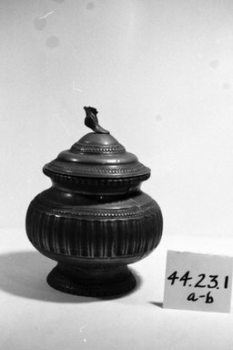 Possibly Dayak. <em>Jar and Cover</em>. Brass, 8 1/4 × 6 1/2 × 6 1/2 in. (21 × 16.5 × 16.5 cm). Brooklyn Museum, Gift of Mrs. William Sterling Peters, 44.23.1a-b. Creative Commons-BY (Photo: Brooklyn Museum, CUR.44.23.1a-b_bw.jpg)