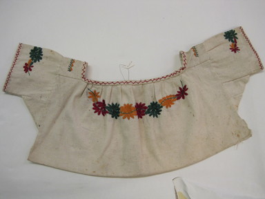  <em>Woman's Unfinished Blouse</em>, ca. 1945. Cotton, 9 7/16 x 21 1/16 in. (24 x 53.5 cm). Brooklyn Museum, Gift of Carolyn Schnurer, 45.108.10. Creative Commons-BY (Photo: , CUR.45.108.10.jpg)