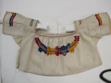  <em>Woman's Unfinished Blouse</em>, ca. 1945. Cotton, 10 1/4 x 21 7/16 in. (26 x 54.5 cm). Brooklyn Museum, Gift of Carolyn Schnurer, 45.108.11. Creative Commons-BY (Photo: , CUR.45.108.11.jpg)