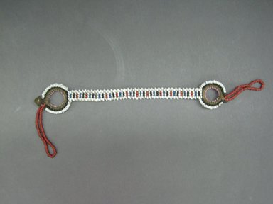 Zulu. <em>Head Ornament</em>, late 19th century. Glass seed beads, bamboo, natural fiber, 8 5/8 x 1 3/8 in. (21.9 x 3.5 cm). Brooklyn Museum, Gift of Mrs. Herman Eggers, 45.125.9. Creative Commons-BY (Photo: Brooklyn Museum, CUR.45.125.9_overall.jpg)