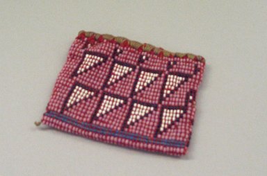 Hochunk. <em>Beaded Bag</em>. Woven wool, beads, 7.5 x 6.4 cm / 3 x 2 1/2 in. Brooklyn Museum, By exchange, 46.100.33. Creative Commons-BY (Photo: Brooklyn Museum, CUR.46.100.33_view1.jpg)