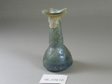 Roman. <em>Small Bottle or Vase</em>, 1st-3rd century C.E. Glass, 3 1/4 x greatest diam. 1 5/8 in. (8.3 x 4.1 cm). Brooklyn Museum, Gift of Mrs. Adrian Van Sinderen, 46.154.10. Creative Commons-BY (Photo: Brooklyn Museum, CUR.46.154.10_view2.jpg)