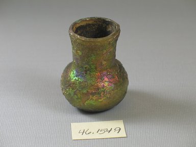 Roman. <em>Small Jar</em>, 4th-9th century C.E. Glass, 1 15/16 x Diam. 1 9/16 in. (4.9 x 3.9 cm). Brooklyn Museum, Gift of Mrs. Adrian Van Sinderen, 46.154.9. Creative Commons-BY (Photo: Brooklyn Museum, CUR.46.154.9_view1.jpg)