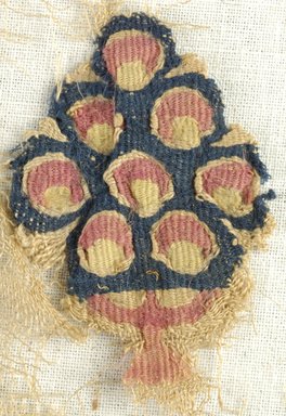 Coptic. <em>Fragment with Botanical Decoration</em>, 5th century C.E. Linen, wool, 15 3/8 x 18 1/8 in. (39 x 46 cm). Brooklyn Museum, Gift of Pratt Institute, 46.157.2. Creative Commons-BY (Photo: Brooklyn Museum (in collaboration with Index of Christian Art, Princeton University), CUR.46.157.2_detail01_ICA.jpg)