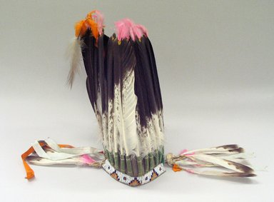 Sioux. <em>Headdress or Feather Bonnet</em>, After 1900. Eagle feather, felt, wool cloth, beads, 17 1/2 x 8 3/4 in. or (44.5 x 22.5 cm). Brooklyn Museum, Charles Stewart Smith Memorial Fund, 46.96.1. Creative Commons-BY (Photo: Brooklyn Museum, CUR.46.96.1_view1.jpg)