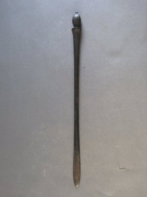  <em>Lime Spatula (Kena)</em>. Wood, 11/16 × 12 5/16 in. (1.8 × 31.2 cm). Brooklyn Museum, Gift of Mrs. Howard M. Morse, 47.44.1. Creative Commons-BY (Photo: Brooklyn Museum, CUR.47.44.1_overall.jpg)