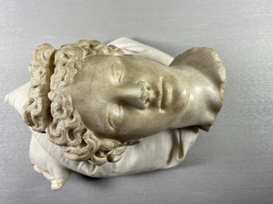  <em>Marble Head, Probably a Goddess</em>, 69-96 C.E. Marble, 7 1/16 × 4 1/2 × 5 11/16 in. (18 × 11.5 × 14.5 cm). Brooklyn Museum, Gift of Mrs. Leo R. Healy, 47.69. Creative Commons-BY (Photo: Brooklyn Museum, CUR.47.69_view01.jpg)