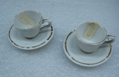 Tucker and Hemphill. <em>Miniature Teaset</em>, 1831-1837. Porcelain, Teapot: 3 in. (7.6 cm). Brooklyn Museum, Gift of Arthur W. Clement, 48.1.1a-h. Creative Commons-BY (Photo: Brooklyn Museum, CUR.48.1.1e-h_view2.jpg)