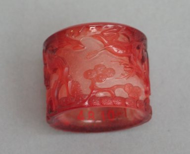  <em>Archer's Thumb Ring</em>. Peking glass, 1 1/8 x 1 5/16 in. (2.8 x 3.3 cm). Brooklyn Museum, Charles Edwin Wilbour Fund, 48.10.1. Creative Commons-BY (Photo: Brooklyn Museum, CUR.48.10.1_side1.jpg)