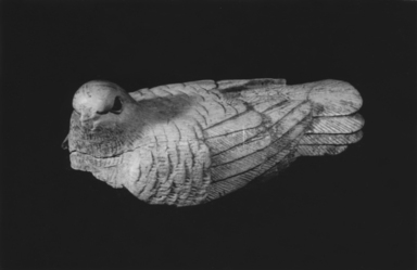  <em>Pigeon Carved in Bone</em>. Bone (?), Egyptian alabaster (calcite) (?), 7/8 x 2 3/16 in. (2.2 x 5.6 cm). Brooklyn Museum, Gift of Mr. and Mrs. Alastair Bradley Martin, 48.175. Creative Commons-BY (Photo: , CUR.48.175_NegA_print_bw.jpg)
