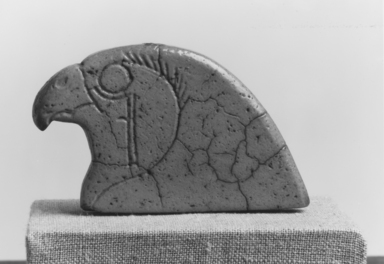  <em>Falcon Head Endpiece of a Necklace</em>, ca. 1938-1759 B.C.E. Faience, 2 1/8 x 2 15/16 x 3/8 in. (5.4 x 7.4 x 0.9 cm). Brooklyn Museum, Gift of Mr. and Mrs. Alastair B. Martin, 48.178. Creative Commons-BY (Photo: , CUR.48.178_NegA_print_bw.jpg)