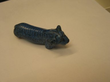  <em>Figurine of a Walking Lioness</em>, 664–332 B.C.E., or 305–30 B.C.E. Faience, 1 1/8 x 3 1/4 in. (2.8 x 8.3 cm). Brooklyn Museum, Gift of Mr. and Mrs. Alastair Bradley Martin, 48.179. Creative Commons-BY (Photo: Brooklyn Museum, CUR.48.179.jpg)
