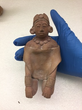  <em>Maya Figurine</em>. Clay, 5 3/4 × 3 × 3 3/8 in. (14.6 × 7.6 × 8.6 cm). Brooklyn Museum, 48.2.5. Creative Commons-BY (Photo: , CUR.48.2.5_view01.jpg)