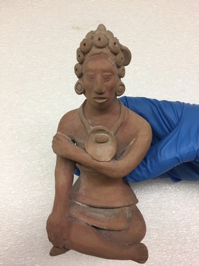  <em>Maya Figurine</em>. Clay, 5 7/8 × 2 3/4 × 2 7/8 in. (14.9 × 7 × 7.3 cm). Brooklyn Museum, 48.2.6. Creative Commons-BY (Photo: , CUR.48.2.6.jpg)