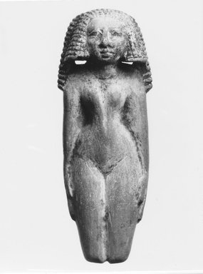  <em>Female Figurine</em>, ca. 1938-1539 B.C.E. Limestone, pigment, 4 5/8 x 1 7/8 in. (11.8 x 4.7 cm). Brooklyn Museum, Charles Edwin Wilbour Fund, 48.25. Creative Commons-BY (Photo: Brooklyn Museum, CUR.48.25_NegC_print_bw.jpg)