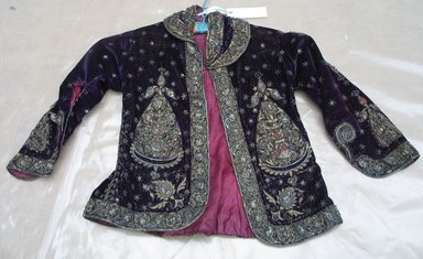  <em>Child's Embroidered Jacket with Sequins</em>. Velvet, Metallic thread, shoulder to shoulder: 11 7/16 x 16 9/16 in. (29 x 42 cm). Brooklyn Museum, Gift of Mrs. Robert Presnell, 48.35 (Photo: Brooklyn Museum, CUR.48.35_view1.jpg)