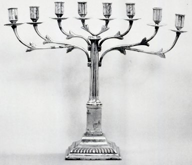 German. <em>Hanukkah Menorah</em>, ca. 1820. Silver-plate, 14 1/2 x 16 x 4 in. (36.8 x 40.6 x 10.2 cm). Brooklyn Museum, Purchased with funds given by Moses Spatt, 49.228.3. Creative Commons-BY (Photo: Brooklyn Museum, CUR.49.228.3.jpg)