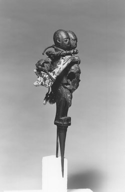 Fon. <em>Bocio</em>, 19th century. Wood, iron, duck’s bill, human jawbone, fiber, organic matter, 15 x 3 x 3 1/2 in.  (38.1 x 7.6 x 8.9 cm). Brooklyn Museum, Museum Expedition 1922, Robert B. Woodward Memorial Fund, 49.45. Creative Commons-BY (Photo: Brooklyn Museum, CUR.49.45_print_threequarter_bw.jpg)