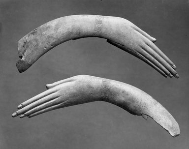  <em>Pair of Clappers in Form of Human Hands</em>, ca. 1539-1190 B.C.E. Ivory, 49.58.1: 1 5/16 x 7 3/8 in. (3.3 x 18.8 cm). Brooklyn Museum, Charles Edwin Wilbour Fund, 49.58.1-.2. Creative Commons-BY (Photo: Brooklyn Museum, CUR.49.58.1_49.58.2_NegA_print.bw.jpg)