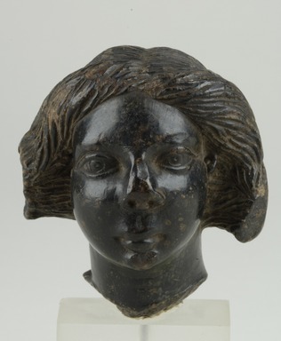  <em>Female Head</em>, 250 C.E.-300 C.E. Steatite, 2 15/16 x max. diam. 2 11/16 in. (7.4 x 6.8 cm). Brooklyn Museum, Gift of Albert Gallatin, 50.60. Creative Commons-BY (Photo: Brooklyn Museum (in collaboration with Index of Christian Art, Princeton University), CUR.50.60_view1_ICA.jpg)