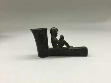 Native American (unidentified). <em>Pipe Bowl with Seated Figure</em>, early 19th century. Stone, 2 7/8 in. (7.3 cm). Brooklyn Museum, Henry L. Batterman Fund and the Frank Sherman Benson Fund, 50.67.140. Creative Commons-BY (Photo: , CUR.50.67.140_view01.jpg)