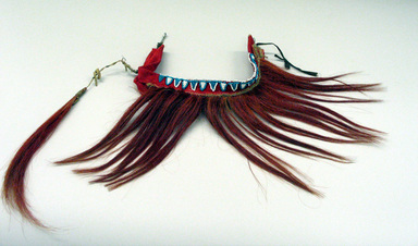 Sioux. <em>Red Headdress with Blue and White Beads</em>, early 19th century. Horse hair, pony beads, Stroud cloth, cotton ribbon, length of headband: 8 in. (20.3 cm). Brooklyn Museum, Henry L. Batterman Fund and Frank Sherman Benson Fund, 50.67.31. Creative Commons-BY (Photo: Brooklyn Museum, CUR.50.67.31.jpg)