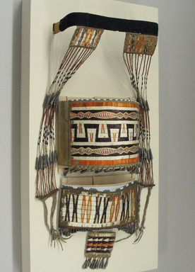 Sioux. <em>Model Cradle Decorations</em>, 1801–1836. Wood, hide, porcupine and bird quills, tin cones, glass beads, wool cloth, Including mount: 7 × 12 × 24 1/8 in. (17.8 × 30.5 × 61.3 cm). Brooklyn Museum, Henry L. Batterman Fund and the Frank Sherman Benson Fund, 50.67.44. Creative Commons-BY (Photo: Brooklyn Museum, CUR.50.67.44_view1.jpg)