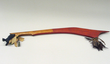 Chippewa (Anishinaabe). <em>War Club</em>, early 19th century. Wood, feather, silk ribbon, pigment, 25 1/2 x 8 x 3/4 in. (64.8 x 20.3 x 1.9 cm). Brooklyn Museum, Henry L. Batterman Fund and the Frank Sherman Benson Fund, 50.67.66. Creative Commons-BY (Photo: Brooklyn Museum, CUR.50.67.66_view1.jpg)