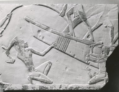  <em>Boat-Building Scene</em>, ca. 664-634 B.C.E. Limestone, pigment, 7 5/8 x 10 5/8 in. (19.4 x 27 cm). Brooklyn Museum, Charles Edwin Wilbour Fund, 51.14. Creative Commons-BY (Photo: Brooklyn Museum, CUR.51.14_NegB_print_bw.jpg)