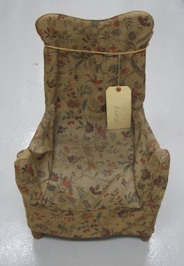  <em>Child's Chair</em>. wood chair. fabric, 25 x 15 x 10 1/2 in. (63.5 x 38.1 x 26.7 cm). Brooklyn Museum, Gift of Mary van Kleeck, 51.157.9. Creative Commons-BY (Photo: Brooklyn Museum, CUR.51.157.9_front.jpg)