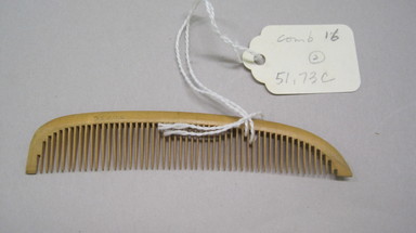  <em>Combs and Stand</em>. Bamboo, wood, silk, Stand: 5 x 9 3/4 x 2 7/8 in.  (12.7 x 24.8 x 7.3 cm). Brooklyn Museum, Gift of Mrs. John F. Shepley, 51.73a-g. Creative Commons-BY (Photo: , CUR.51.73c.jpg)