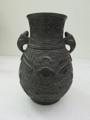  <em>Double-Eared Wine Vessel (Zun)</em>, 20th century. Porcelain with black glaze, 7 1/2 x 5 in. (19 x 12.7 cm). Brooklyn Museum, The William E. Hutchins Collection, Bequest of Augustus S. Hutchins, 52.49.32. Creative Commons-BY (Photo: Brooklyn Museum, CUR.52.49.32.jpg)