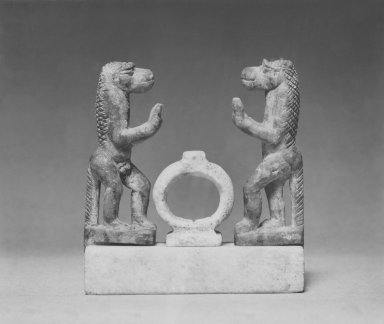  <em>Two Apes on Base with Amulet</em>, 305 B.C.E.–100 C.E. Stone, marble, Apes: 1 7/8 in. (4.8 cm). Brooklyn Museum, Charles Edwin Wilbour Fund, 52.74a-d. Creative Commons-BY (Photo: Brooklyn Museum, CUR.52.74_NegA_print_bw.jpg)