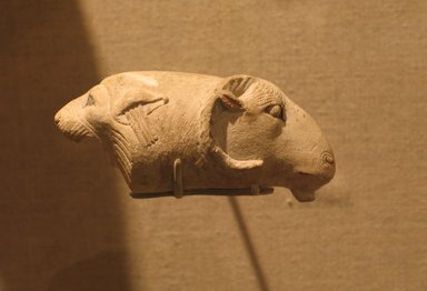  <em>Ram and Lion</em>, 525-404 B.C.E. Limestone, 3 7/16 in. (8.8 cm). Brooklyn Museum, Charles Edwin Wilbour Fund, 53.174. Creative Commons-BY (Photo: Brooklyn Museum, CUR.53.174_wwg8.jpg)