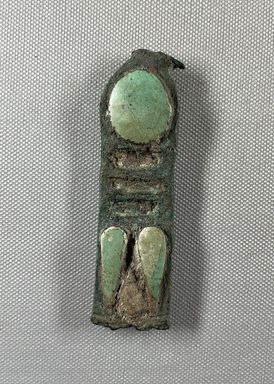  <em>Pendant from an Osiris Flail</em>, 664-30 B.C.E. Bronze, glass, 3 3/4 × 1 1/8 × 3/8 in. (9.6 × 2.8 × 1 cm). Brooklyn Museum, Anonymous gift, 53.176.1. Creative Commons-BY (Photo: Brooklyn Museum, CUR.53.176.1_view01.jpg)