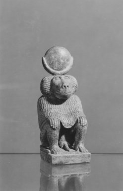  <em>Statuette of a Seated Cynocephalus Ape</em>. Faience, 3 11/16 x 1 1/4 x 1 11/16 in. (9.4 x 3.2 x 4.3 cm). Brooklyn Museum, Anonymous gift, 53.177.4. Creative Commons-BY (Photo: Brooklyn Museum, CUR.53.177.4_NegA_print_bw.jpg)