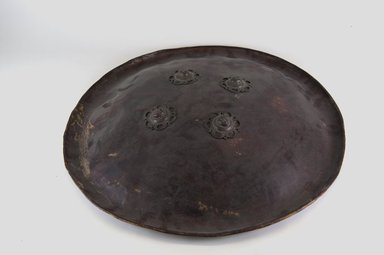  <em>Shield</em>, 17th-18th century. Rhinoceros hide, diam: 18 1/8 in. (46 cm). Brooklyn Museum, Gift of Dr. and Mrs. Frank L. Babbott, Jr., 54.118. Creative Commons-BY (Photo: Brooklyn Museum, CUR.54.118_front_PS5.jpg)