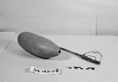  <em>Gourd and Stick</em>. Gourd, wood, A: 2 15/16 x 9 7/16 x 8 3/8 in. (7.5 x 24 x 21.3 cm). Brooklyn Museum, Gift of Helen B. Kramer, 54.185.2a-b. Creative Commons-BY (Photo: Brooklyn Museum, CUR.54.185.2a-b_bw.jpg)