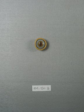  <em>One of Fifteen Circular Stones</em>, ca. 410 B.C.E. Gold, agate, 3/8 x Diam: 13/16 in. (1 x Diam: 2 cm). Brooklyn Museum, Charles Edwin Wilbour Fund, 54.50.8. Creative Commons-BY (Photo: Brooklyn Museum, CUR.54.50.8_view1.jpg)